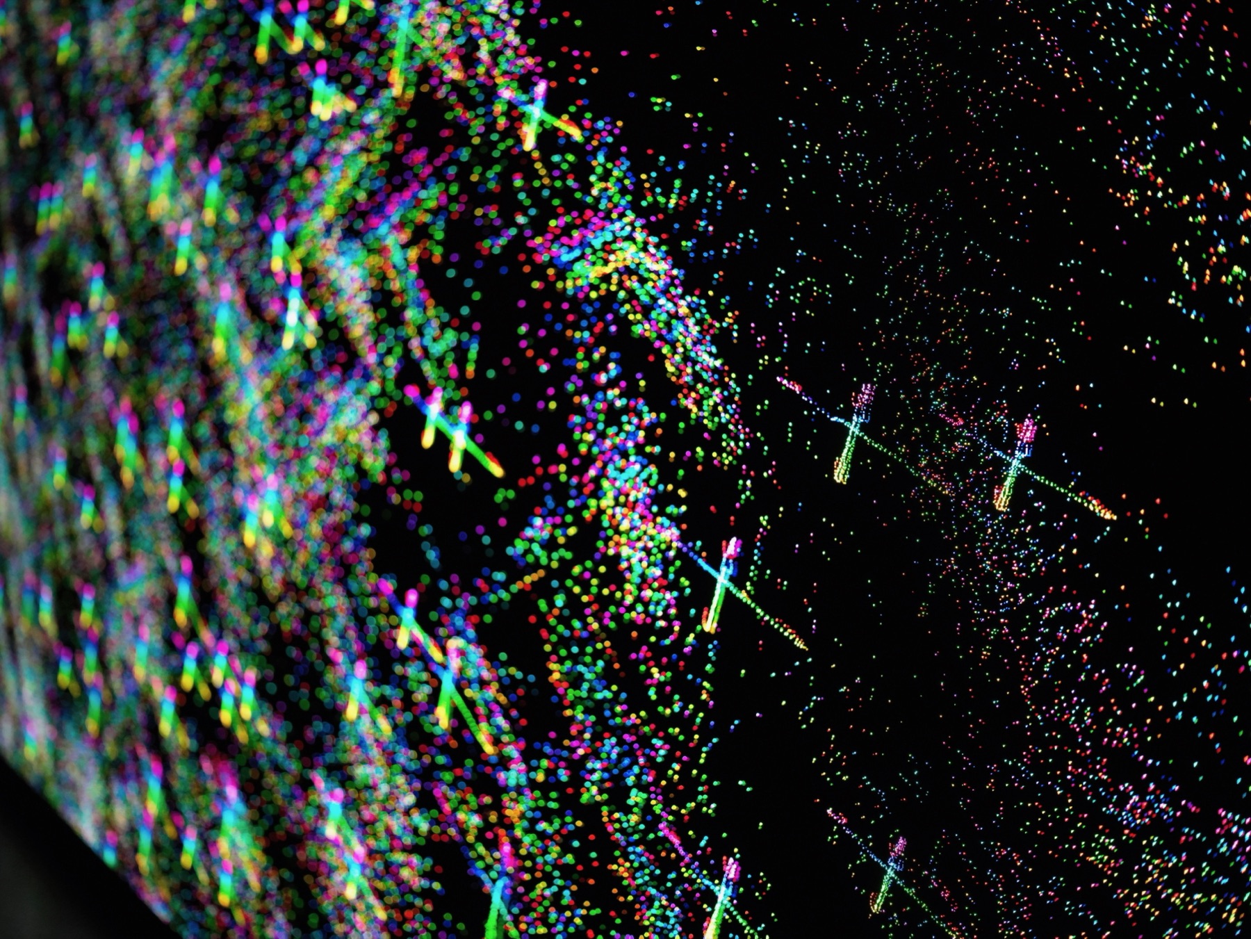 PXL NET at close range — the composition resolving into particles